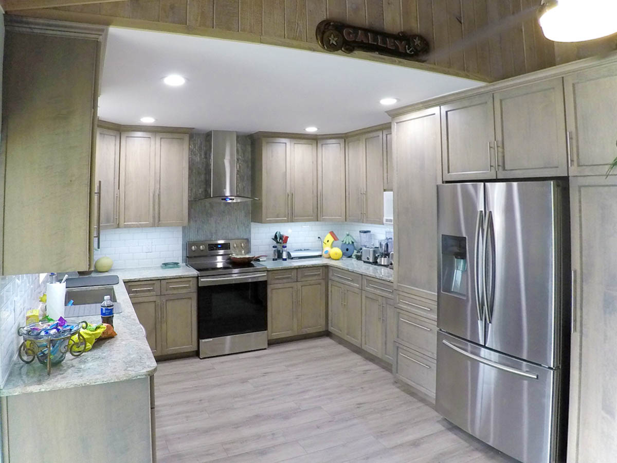 Kitchen includes new Samsung appliances, and an empty pantry for your groceries